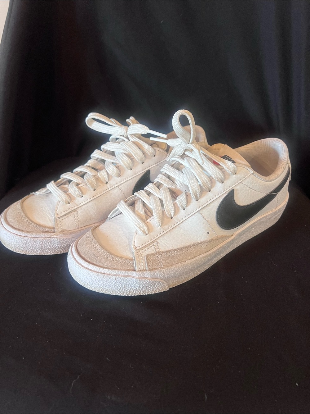 Nike Women's White Sneakers with Black Swoosh Accent
